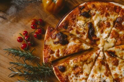 Pizza + Garlic Bread + Wings + Drink — 40% Off